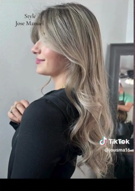 Long dimensional blonde hair styled by Jose Manuel